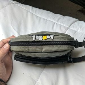 Hand-embroidered camera bag. Gold Tooth.